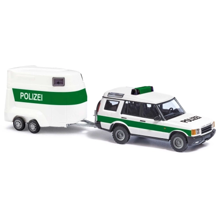 Busch 51936 - Land Rover Discovery policyjny z przyczepą do przewozu koni, rok produkcji 1998